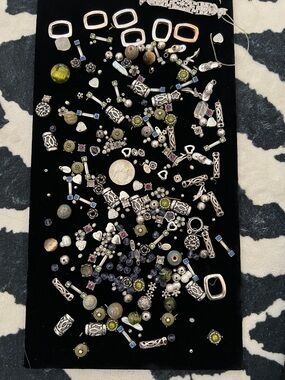 Beads!  Hundreds of beads from broken jewelry.  Mostly Cookie Lee.